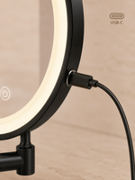 Apvalus LED veidrodis Riva 2 juodu rėmu 43 × 30 cm